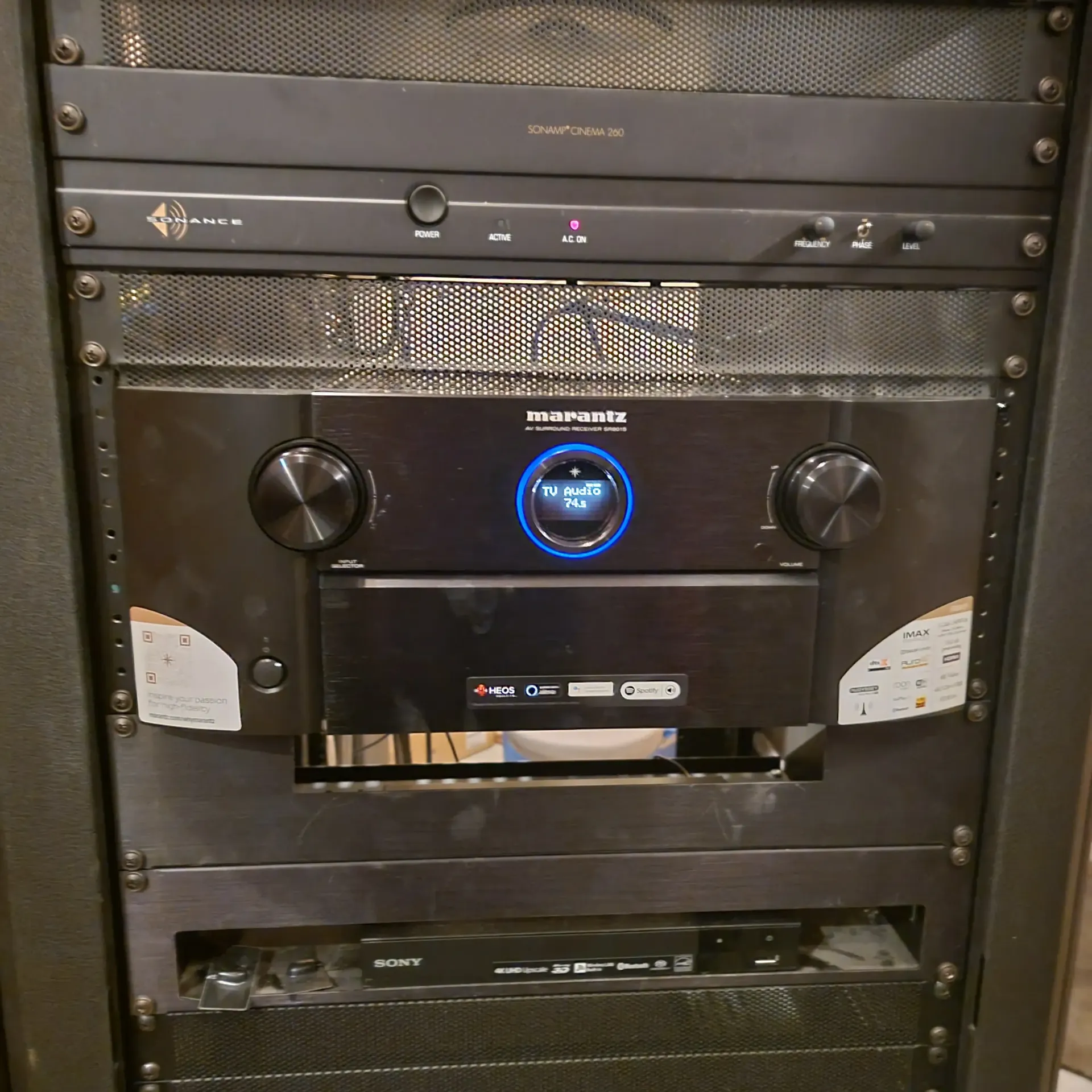 Marantz AV receiver and Sony Blu-ray player installed in professional home theater equipment rack by Montana smart home solutions
