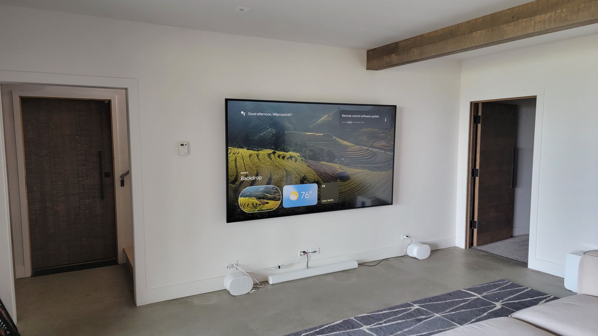 Custom wall-mounted Sony TV installation in a modern smart home living room in Lakeside, Montana