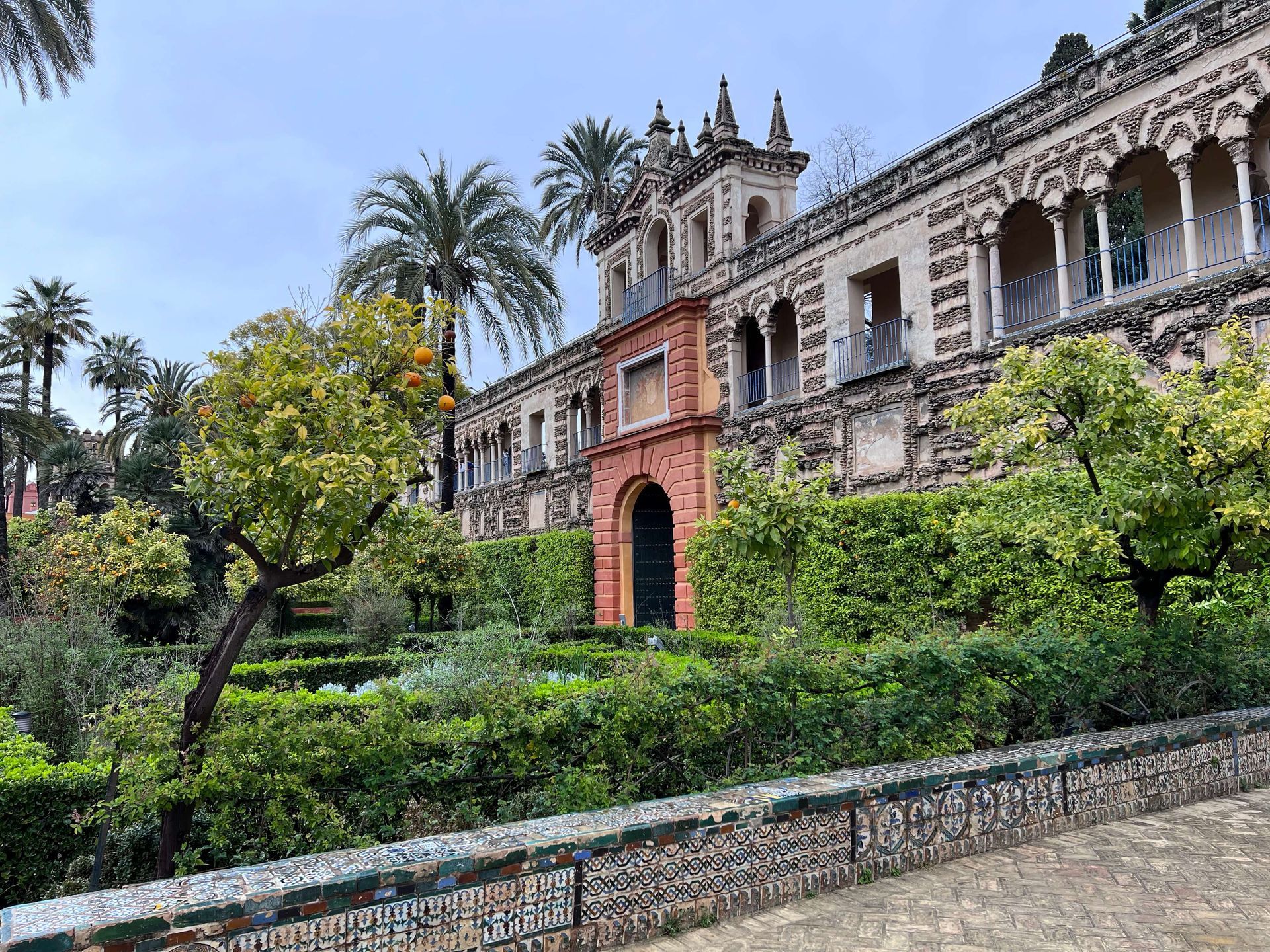 Outside view of a palace with greenery around