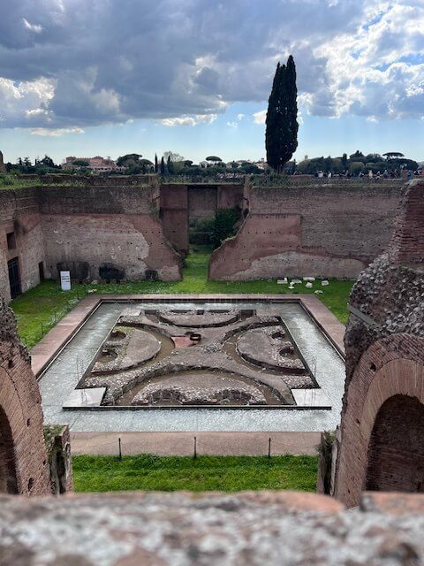 A brick building with a large square in the middle of it