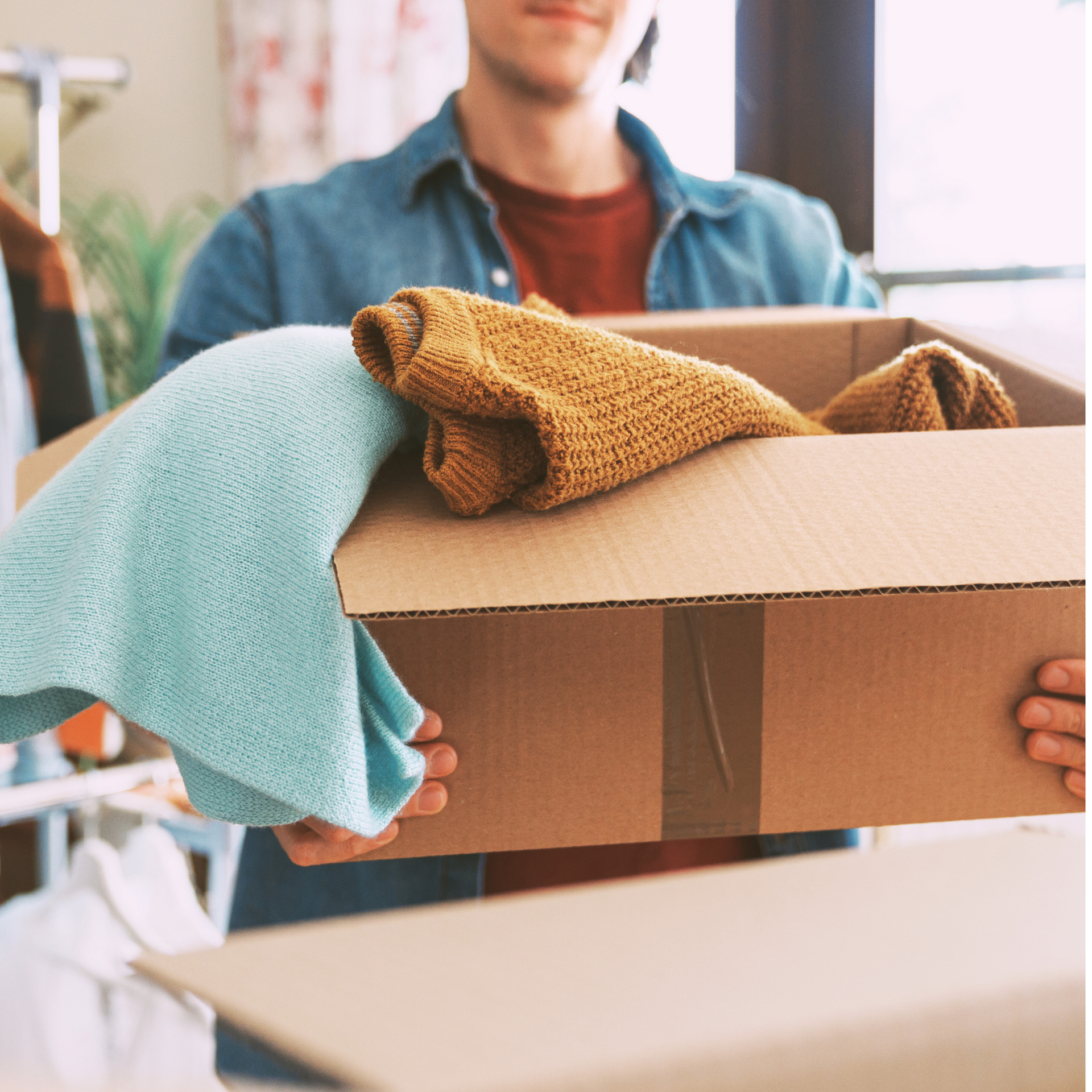 Donations in a box at the Boutique