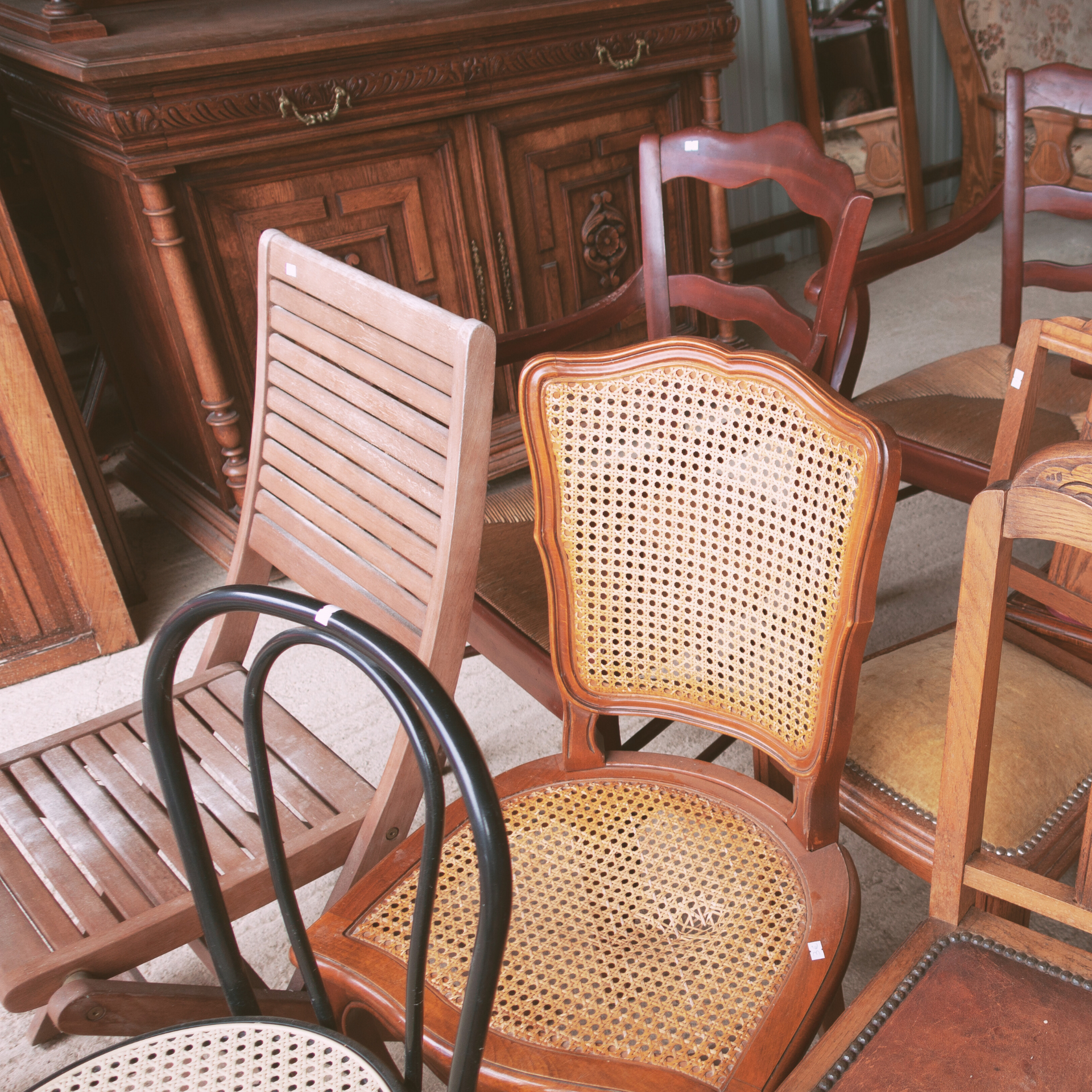 Chairs lined up next to each other. Please call to find out about furniture donations.