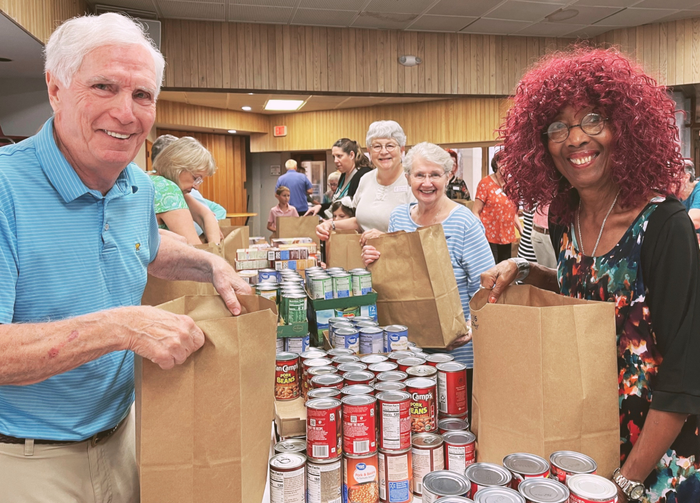 Families Pack Food Bags for the Holidays