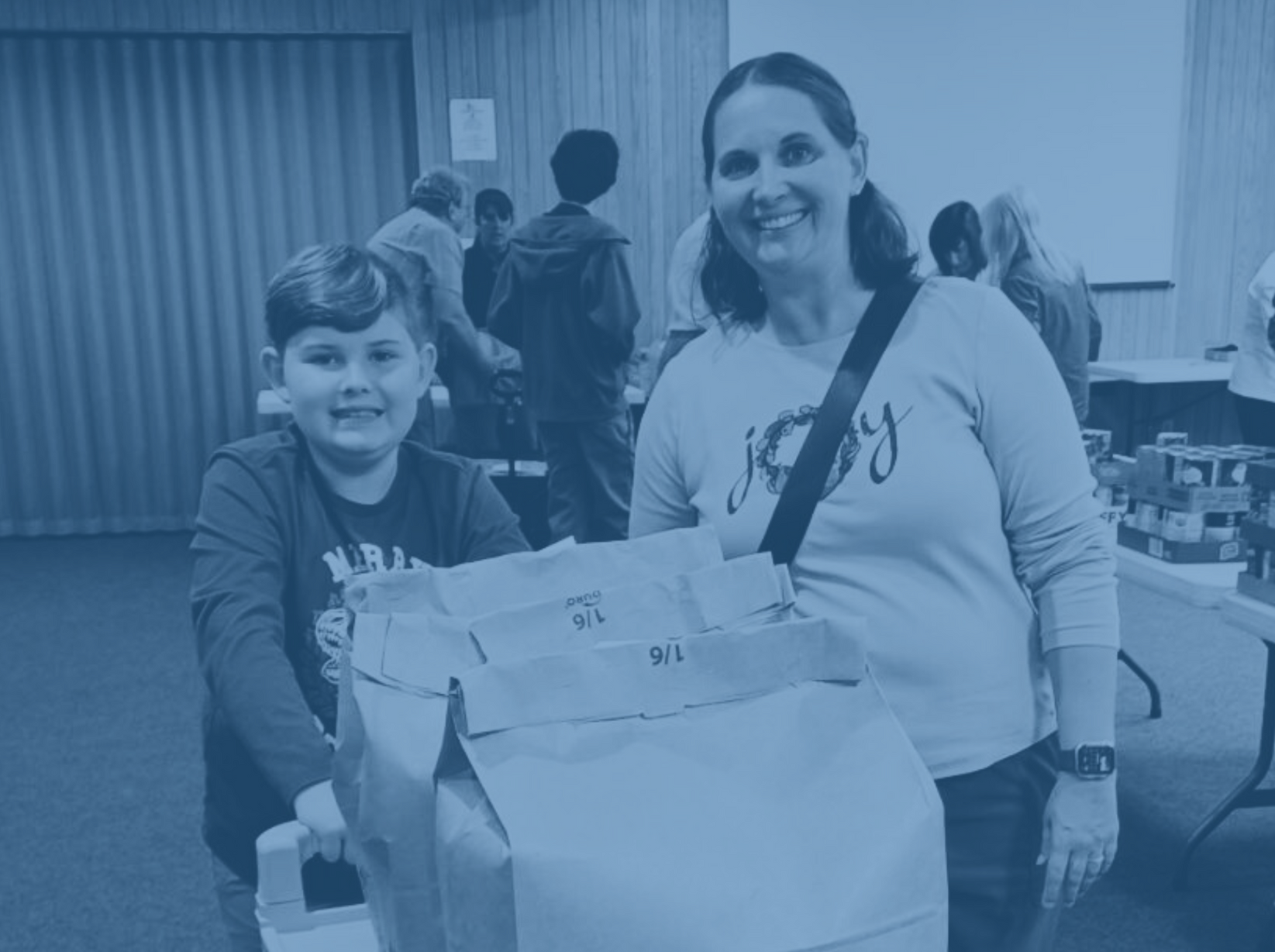 Families Pack Food Bags for the Holidays
