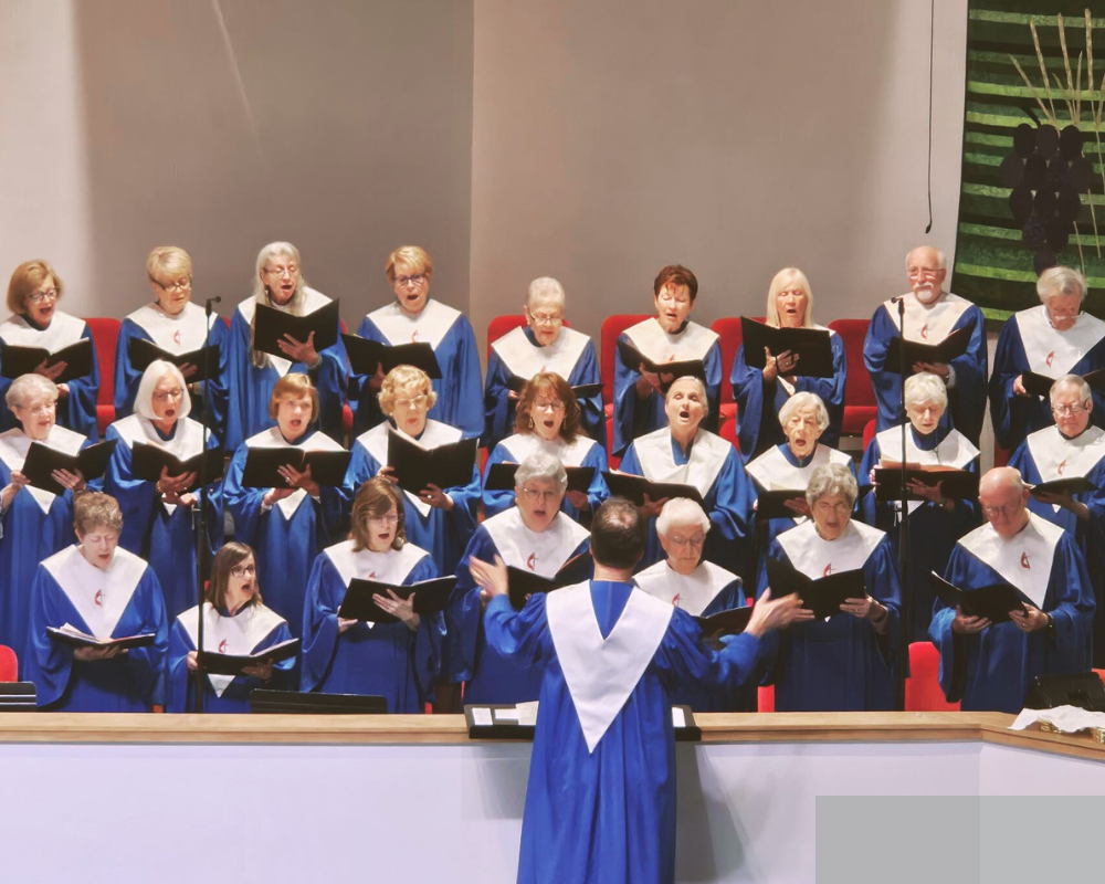Chancel choir people singing in robes