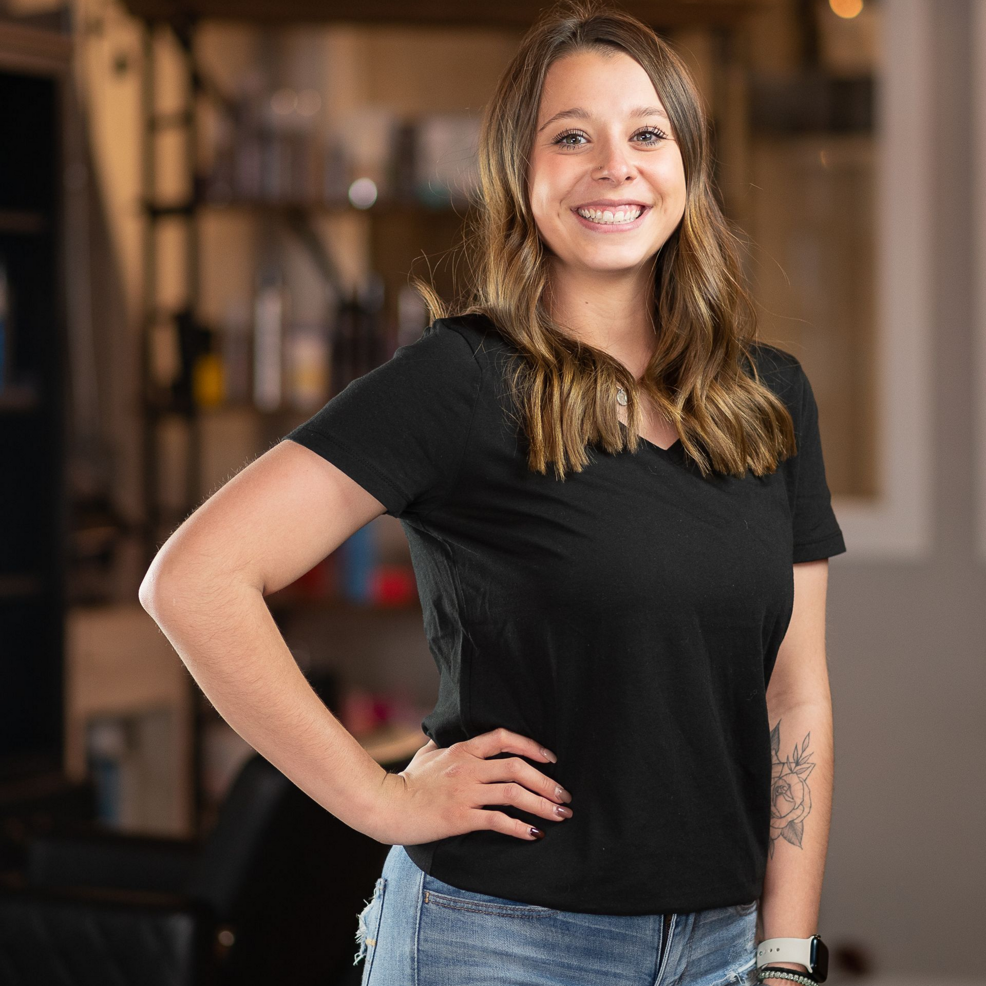 Picture of a Girl with a Black Shirt and Blonde Hair — Laramie, Wy — Luna Salon & Med Spa Picture of a Girl with a Black Shirt and Blonde Hair — Laramie, Wy — Luna Salon & Med Spa