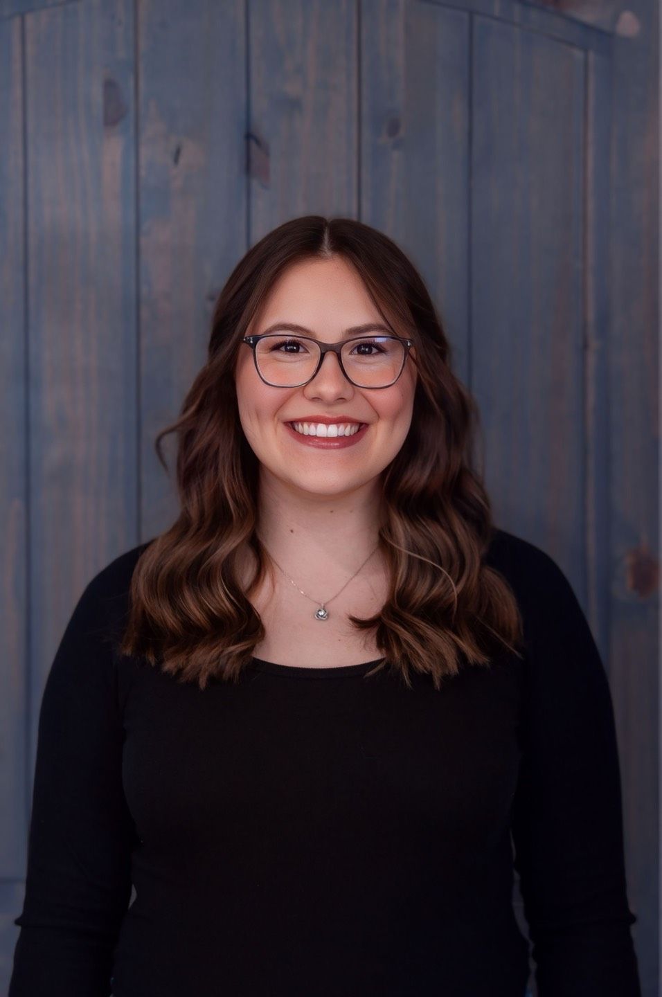 Picture of a Girl with a Black Shirt and Blonde Hair — Laramie, Wy — Luna Salon & Med Spa