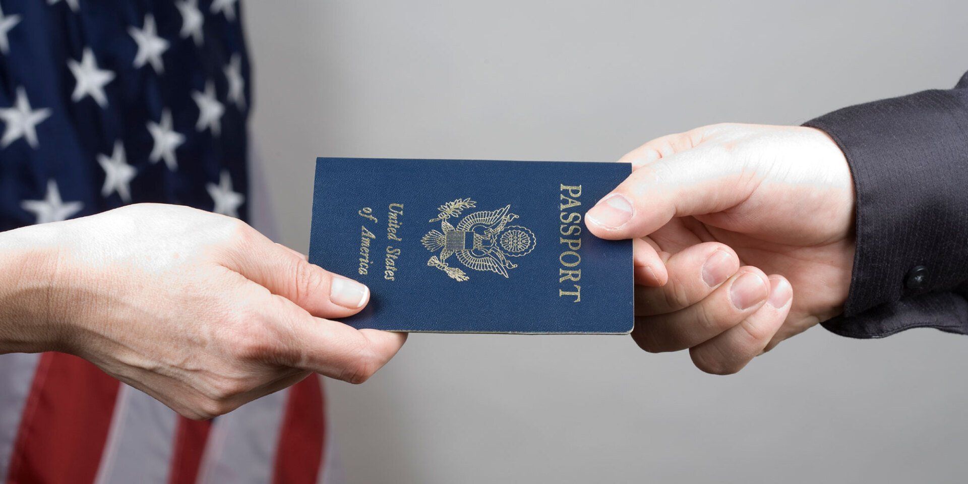 passport being handed to someone