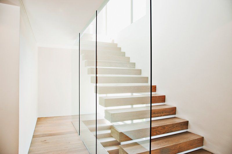 stairs next to glass wall