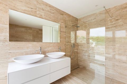 bathroom with glass frameless shower