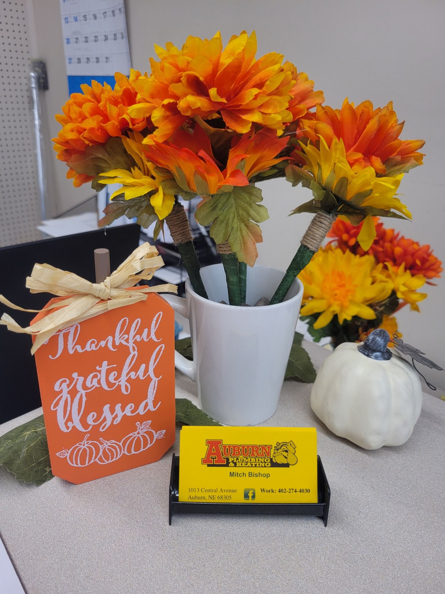 A Thankful Grateful Blessed Sign Next to A Vase of Flowers