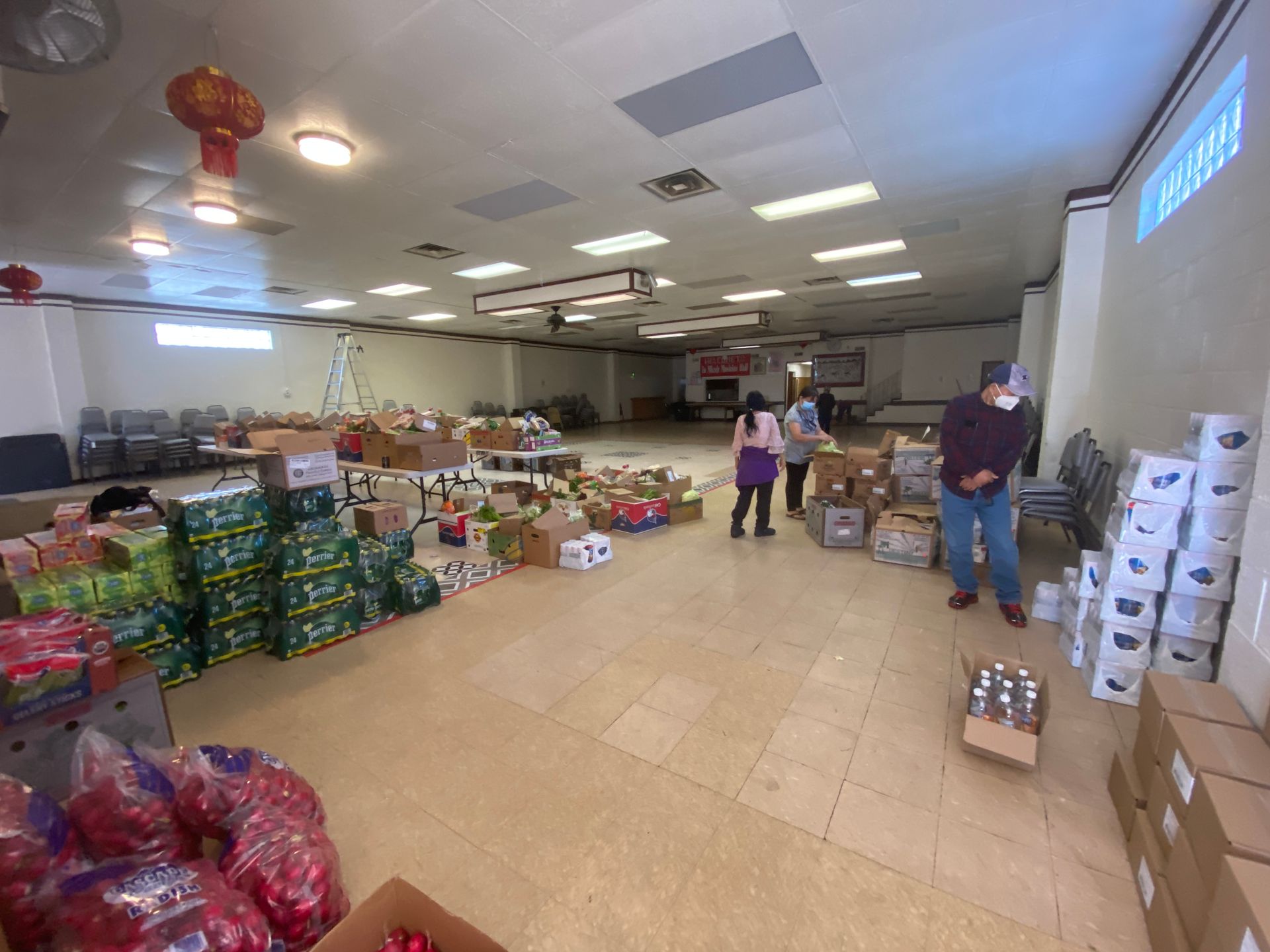 A large room filled with lots of boxes and boxes of food.