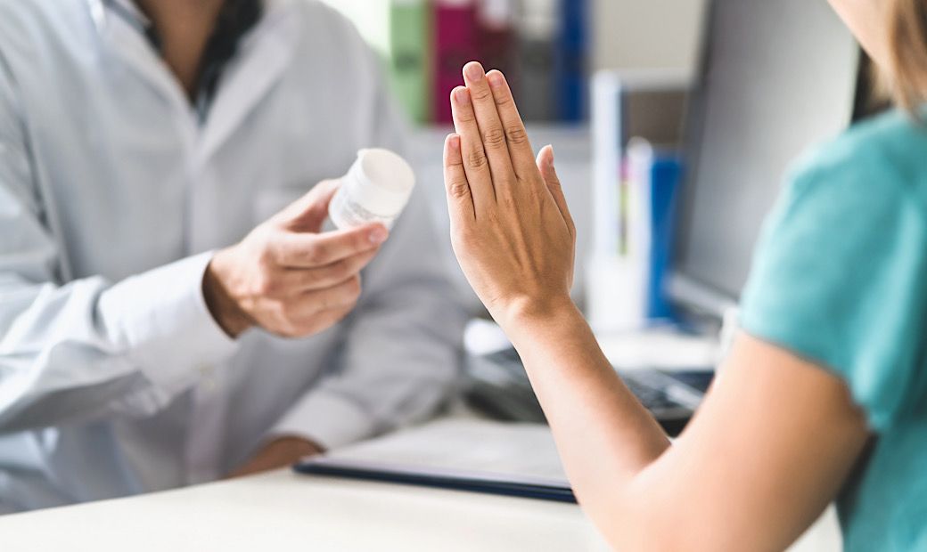 woman denying treatment from doctor