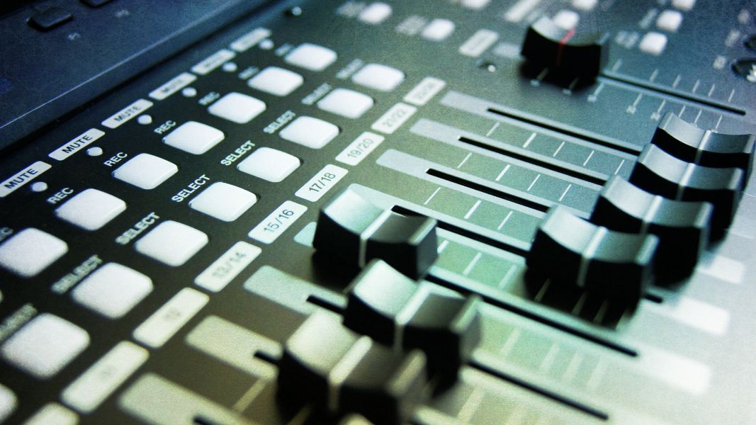 a close up of a mixer with buttons for mute and select