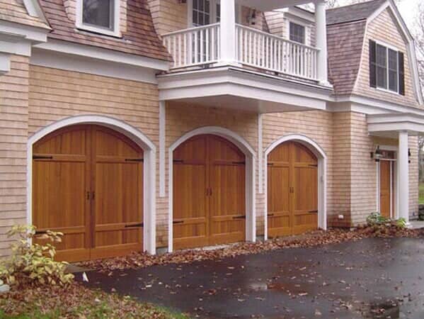 Three Wooden Garage Door of a Large House - Garage Door in Hyannis, MA
