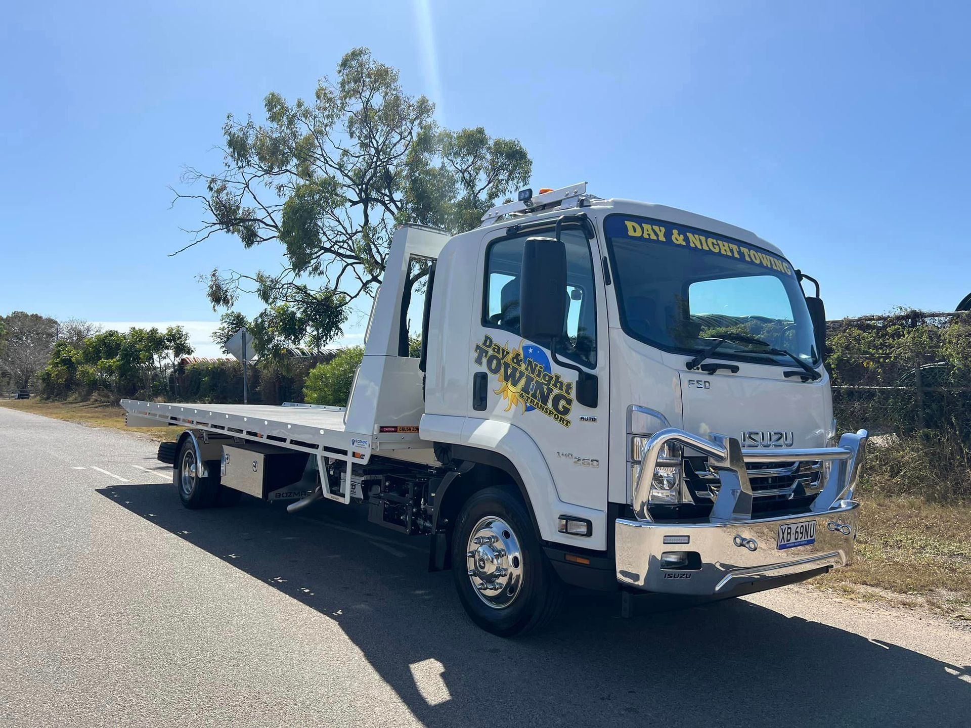 A White Tow Truck Is Parked On The Side Of The Road — Day & Night Towing & Transport In Condon, QLD