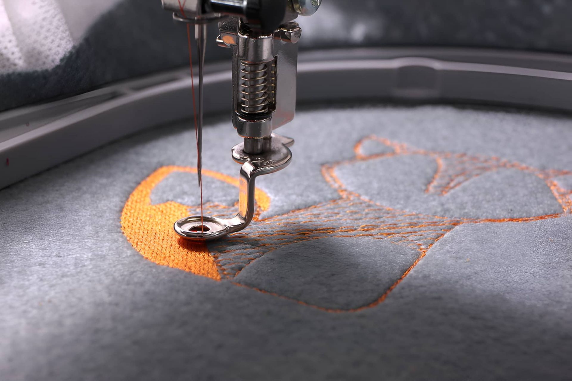 A Close Up Of A Sewing Machine Embroidery On A Piece Of Fabric — Gympie Embroidery Services In Southside, QLD