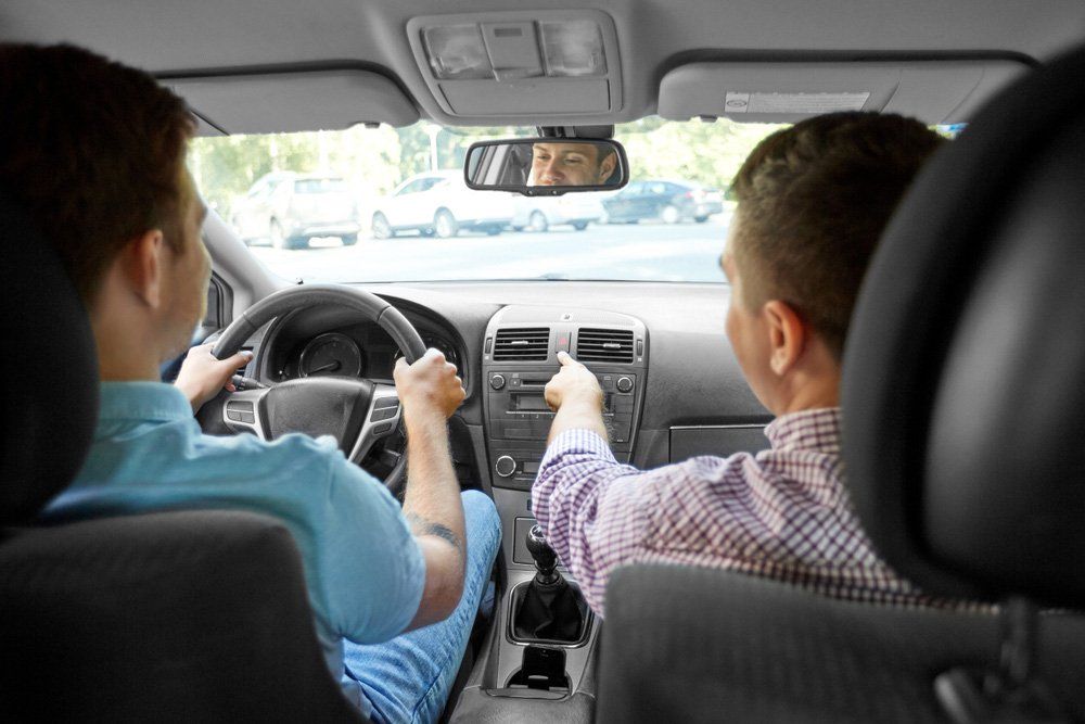 Instructor Teaching Young Man to Drive — Blog in Townsville QLD