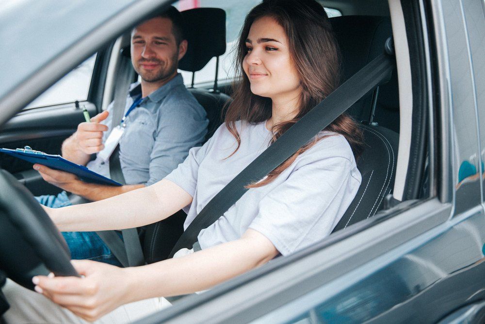 Male Instructor and Female Student — Driving Tips in Townsville QLD