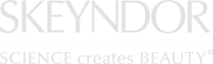 El logotipo de skeyndor la ciencia crea belleza está sobre un fondo blanco.