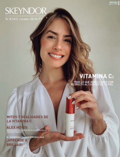 una mujer sostiene una botella de vitamina c en la portada de una revista