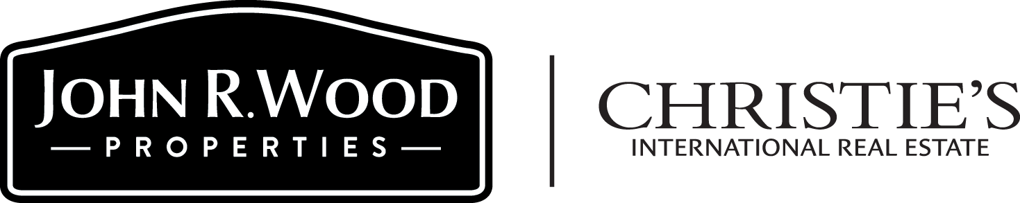 The logo for john r. wood properties and christies international real estate
