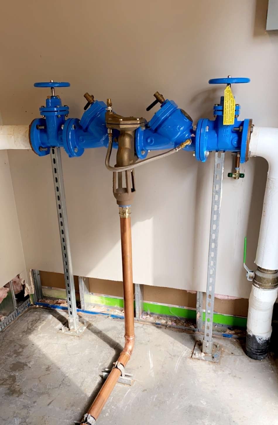 Emergency eyewash station and shower system with a water heater.