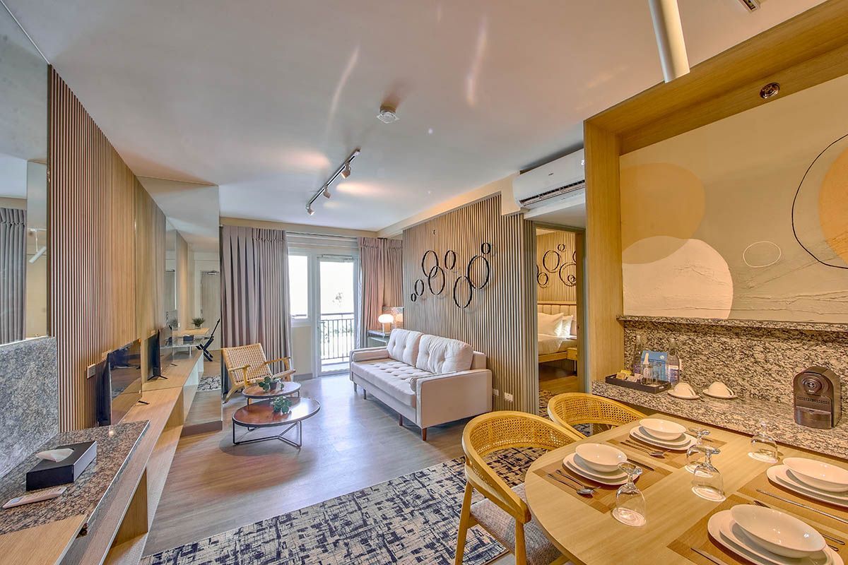 The spacious and tastefully designed living room at The Connor, one of the best hotels in San Juan, Metro Manila, for in-suite comfort.