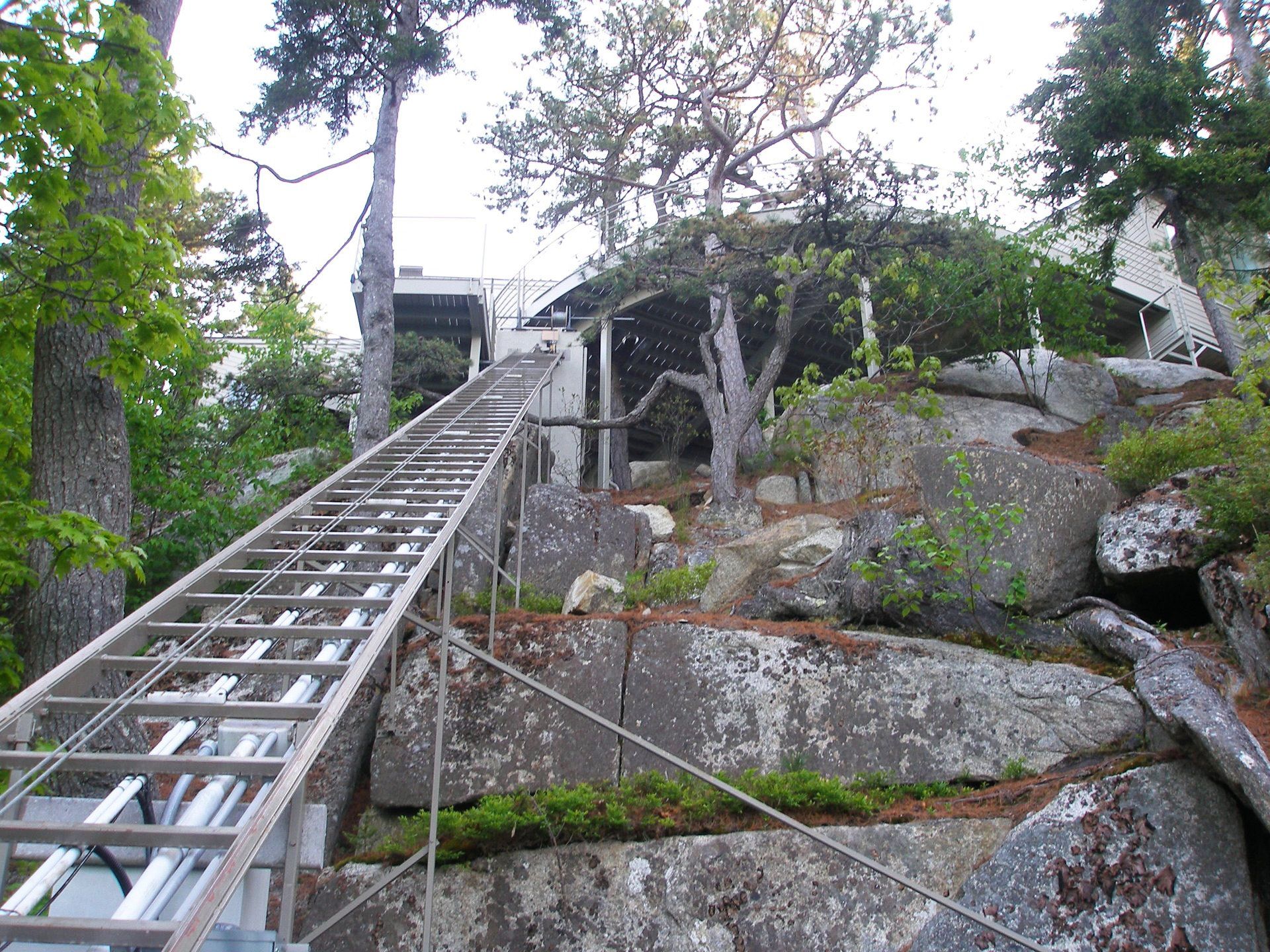 Rocky and Steep Hill Climb Solution with Hillside Trams Elevator Lifts - Brooksville, ME Property