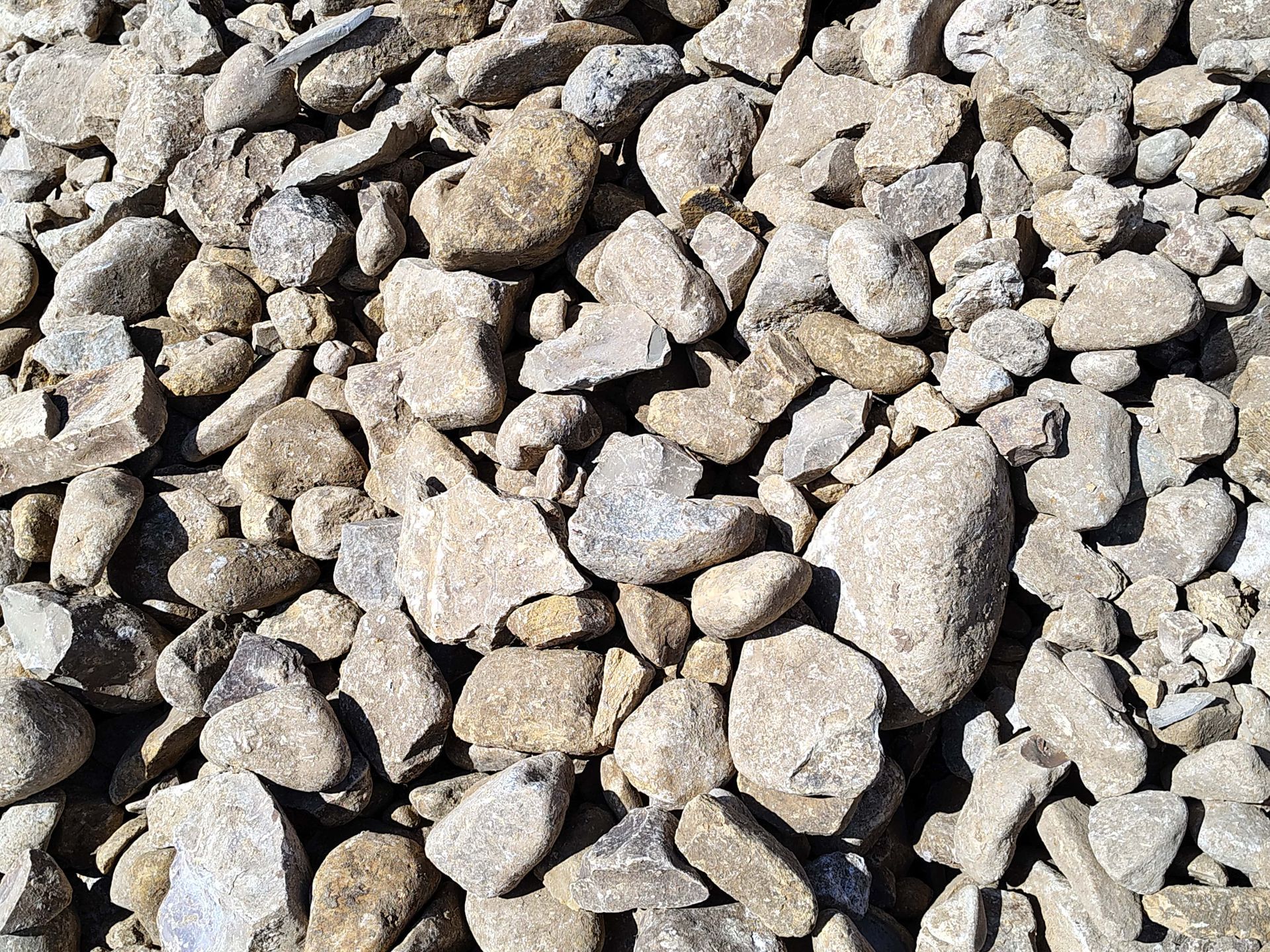 Pile of tan and gray gravel.