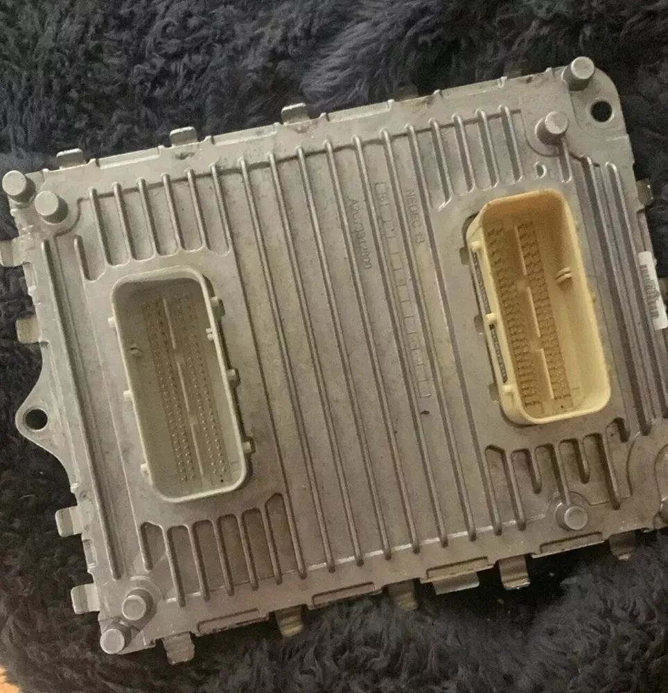 A computer chip is sitting on top of a furry blanket.