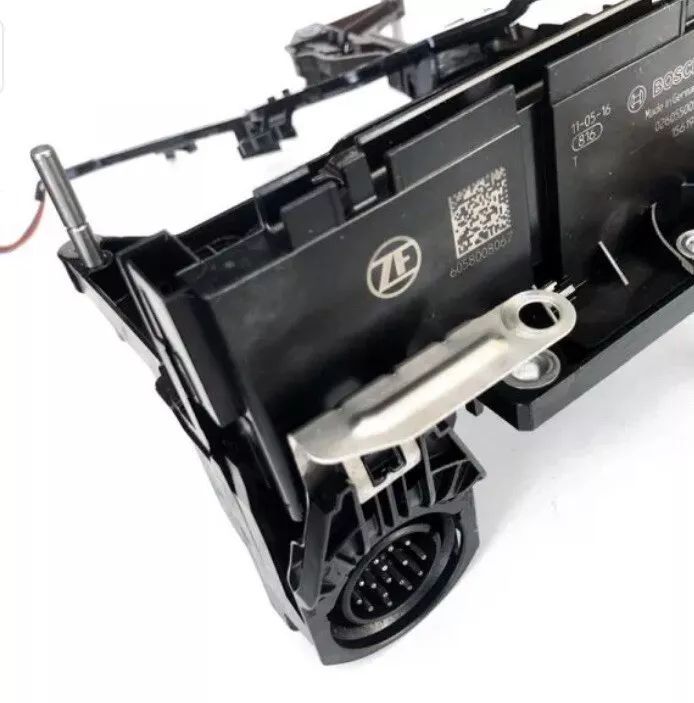 A black item with a zf logo on it