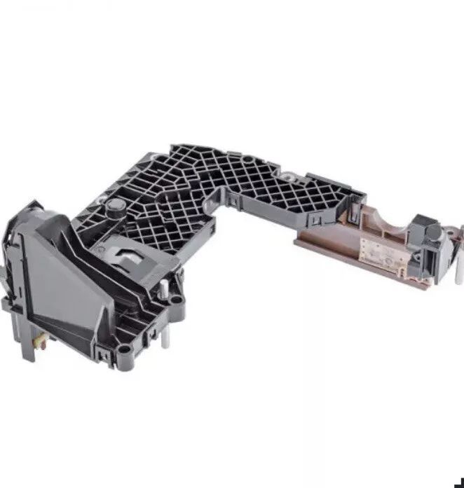 A close up of a piece of plastic on a white background.