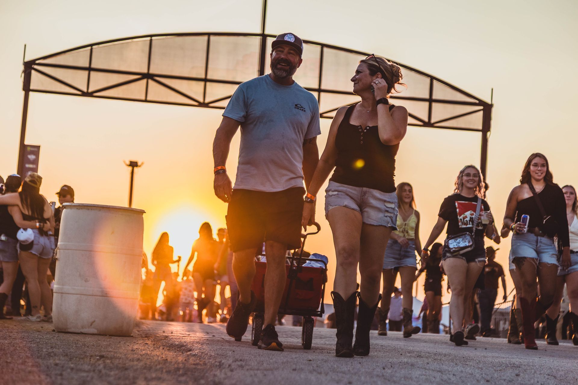 Country music fans in cowboy hats at festival