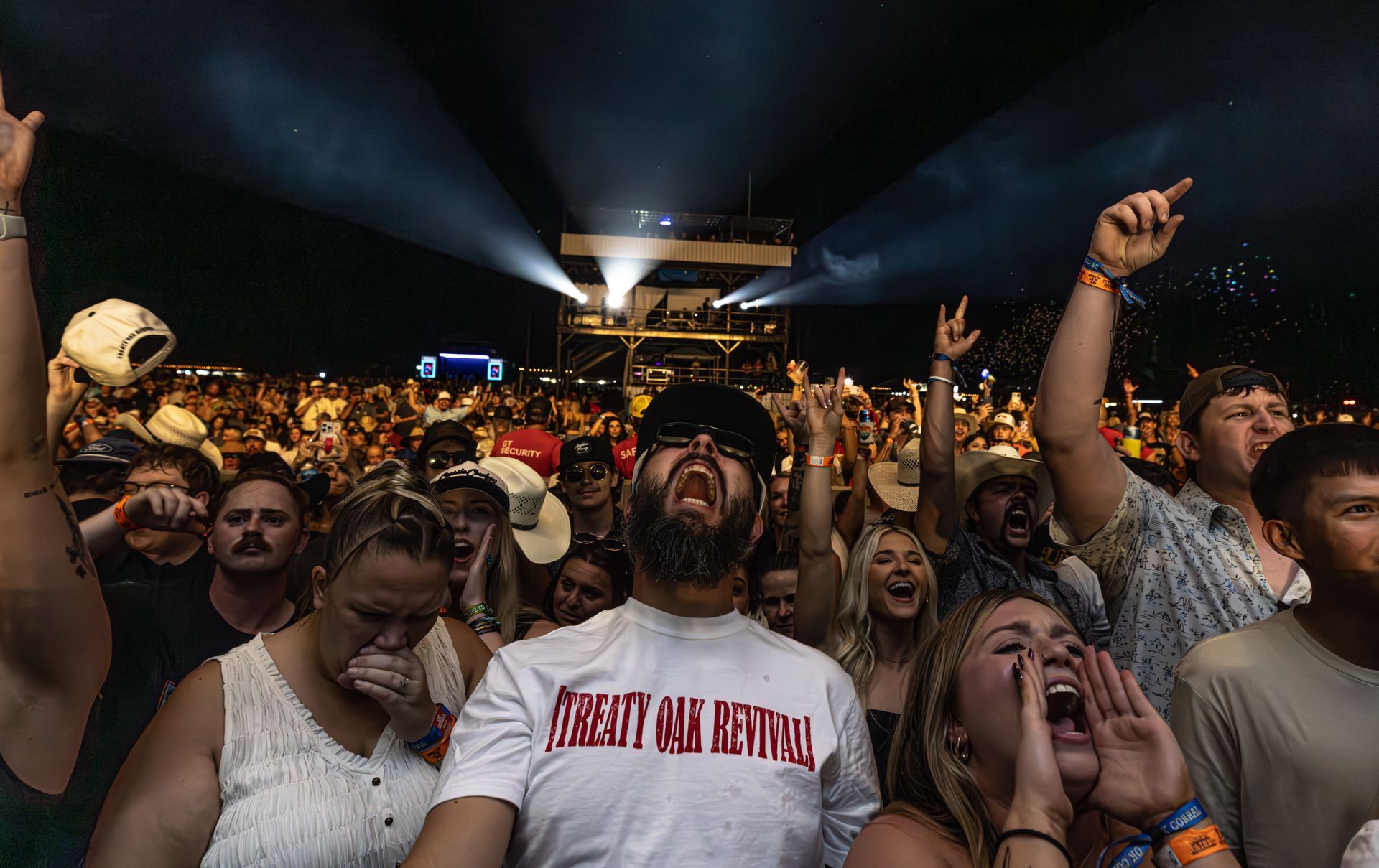 Fans at night country music performance