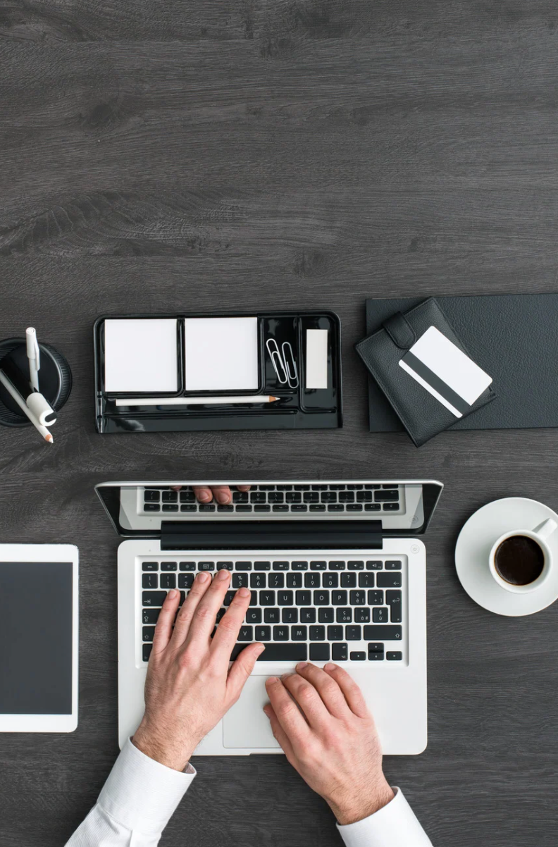 Healthcare professional reviewing healthcare coding and compliance audit findings on a laptop