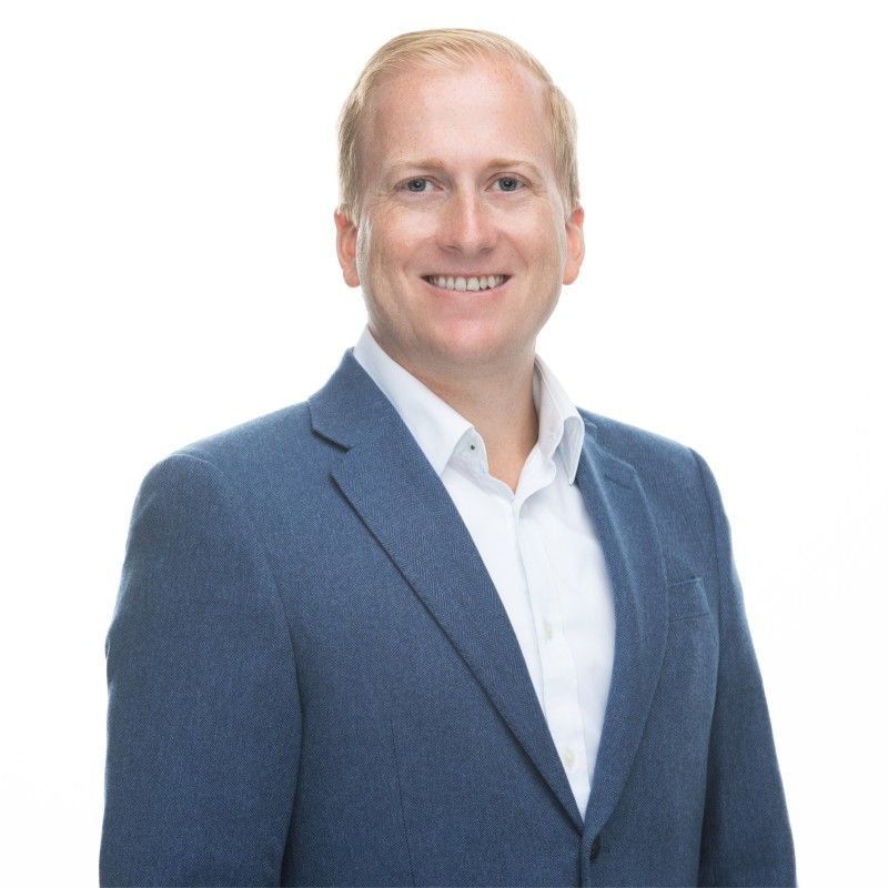 Headshot of Tyler Moore, VP of Strategic Account Management at UASI