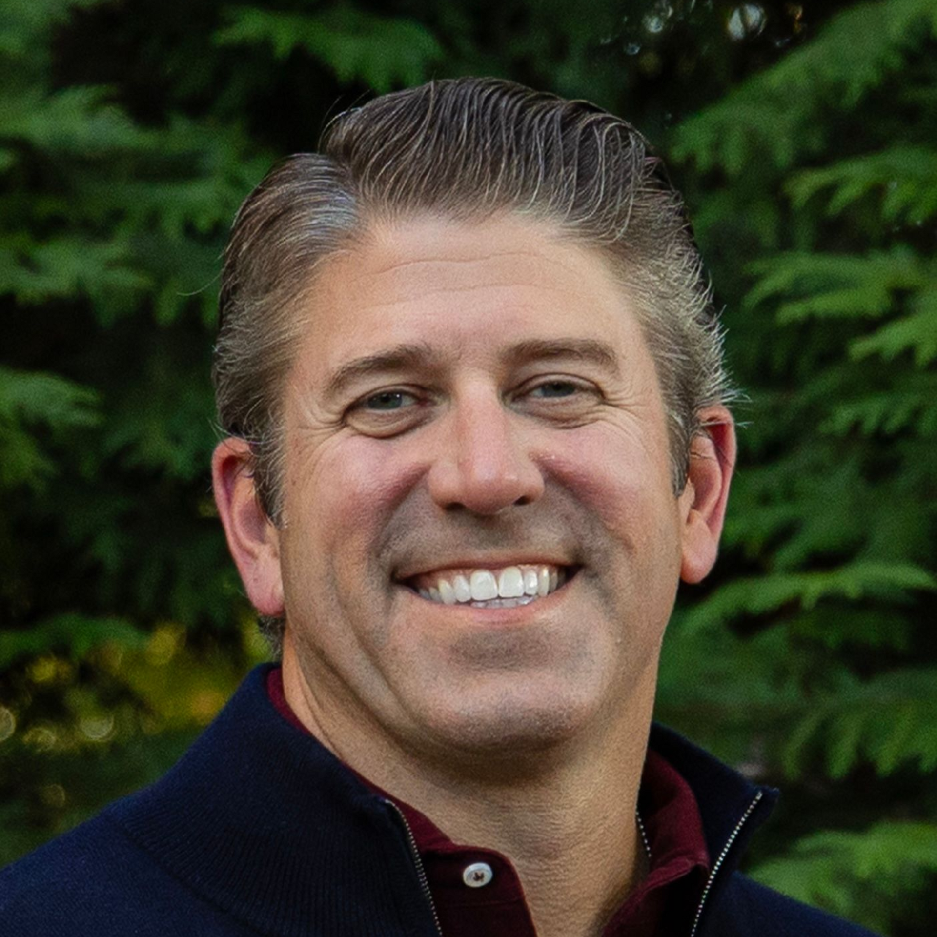 Headshot of Michael Burke, Co-Owner and Head of Employee Engagement at UASI