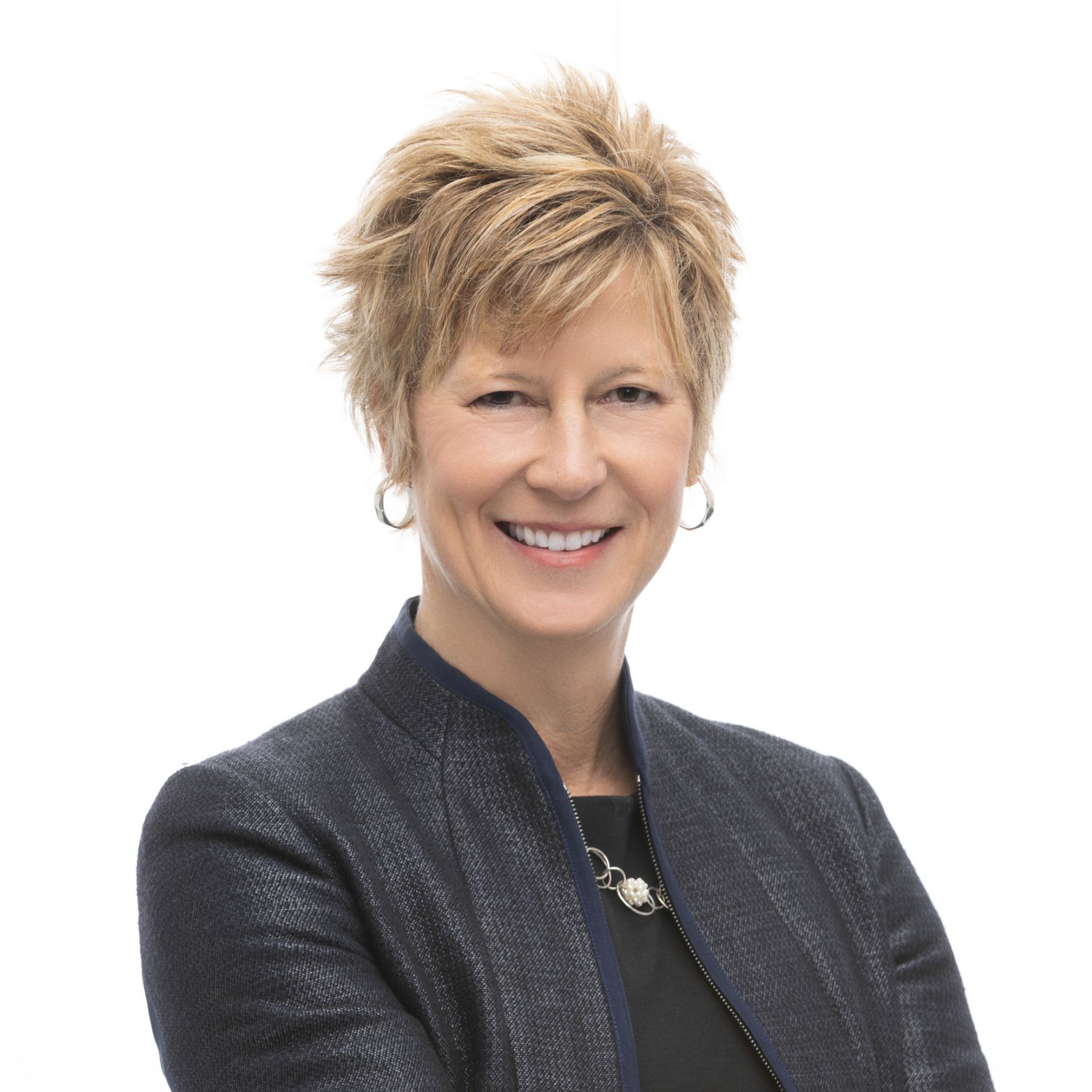 Headshot of Nancy Koors, CEO at UASI