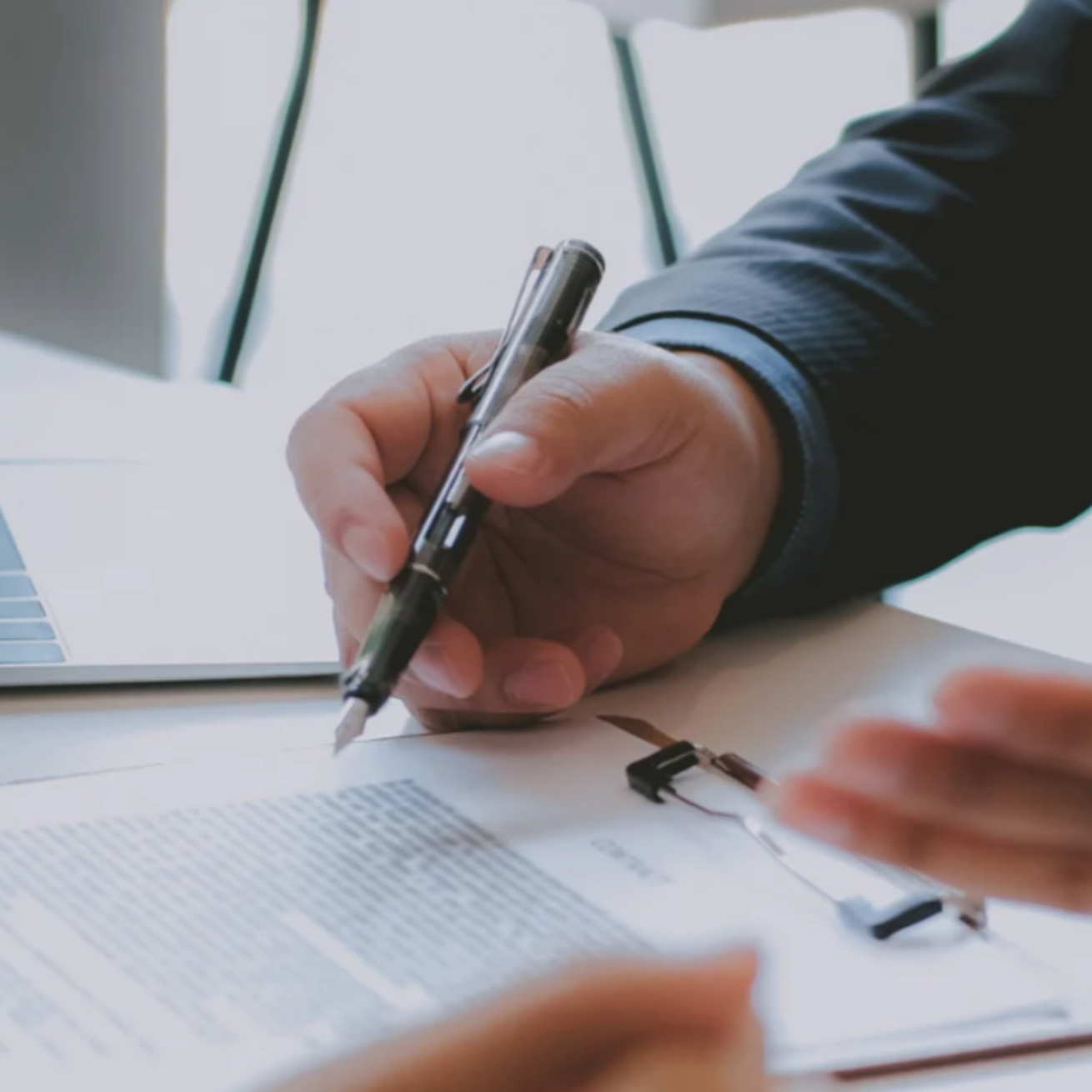 Consultant reviewing documentation and workflows to improve mid-cycle performance.