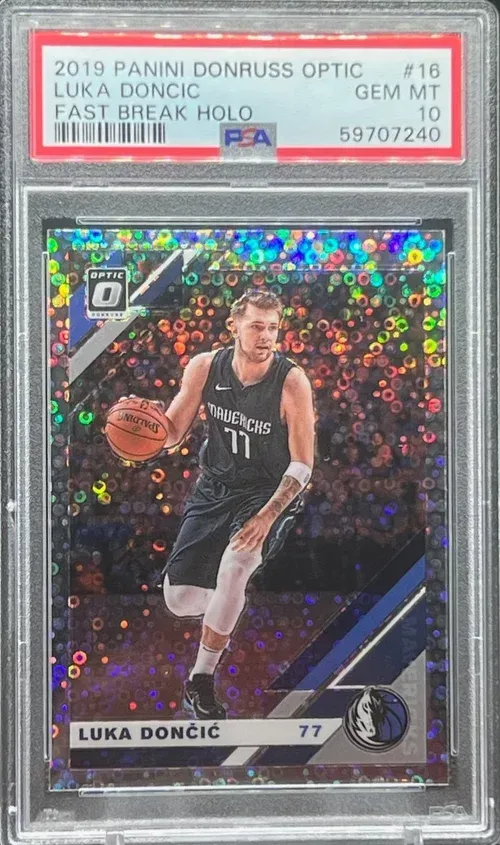 Luka Dončić basketball card graded GEM MT 10. Holographic finish, Dallas Mavericks uniform.