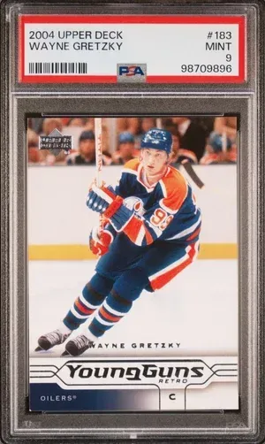 Wayne Gretzky hockey card graded Mint 9 by PSA. Gretzky in Oilers uniform, action shot.