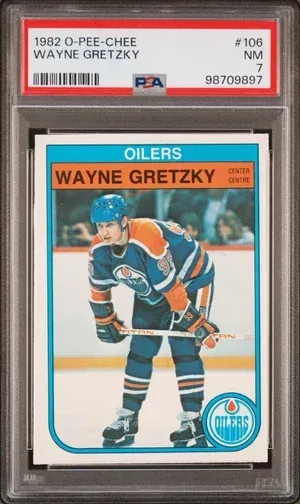 Wayne Gretzky hockey card from 1982, graded NM 7 by PSA, featuring Gretzky in Oilers uniform.