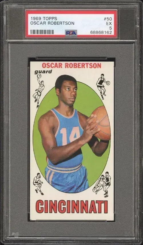 1969 Topps Oscar Robertson basketball card, PSA graded. Robertson in blue Cincinnati uniform, holding a ball.