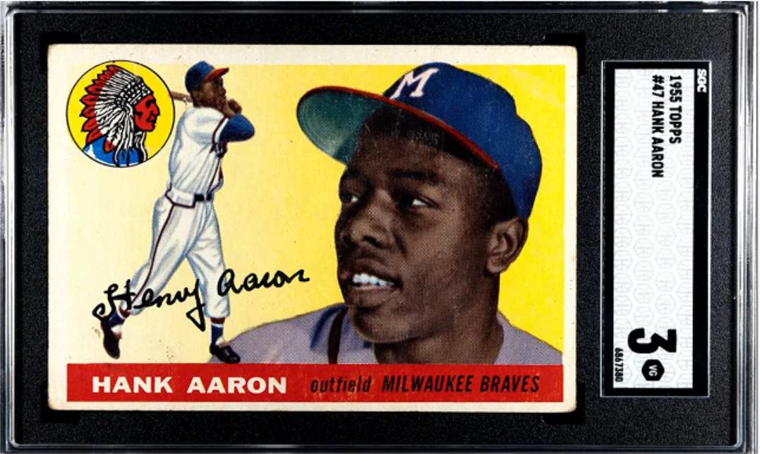 Baseball card of Hank Aaron, in a graded case; he's in Braves uniform, smiling.