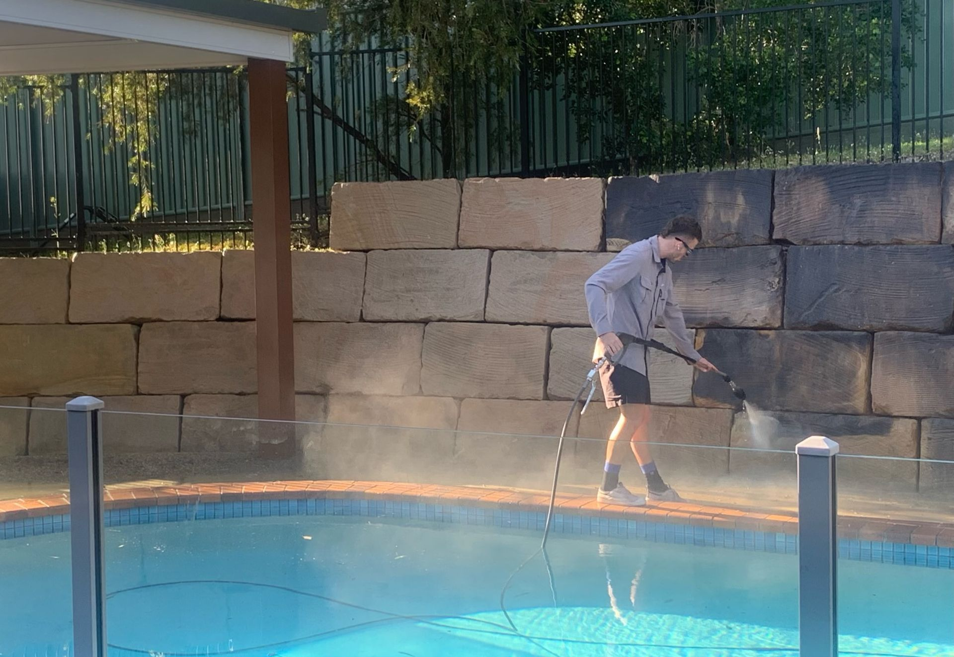 Side-by-side Comparison of a Brick Patio Before and After Cleaning — Blast It Pressure Cleaning - Gold Coast In Gold Coast, QLD