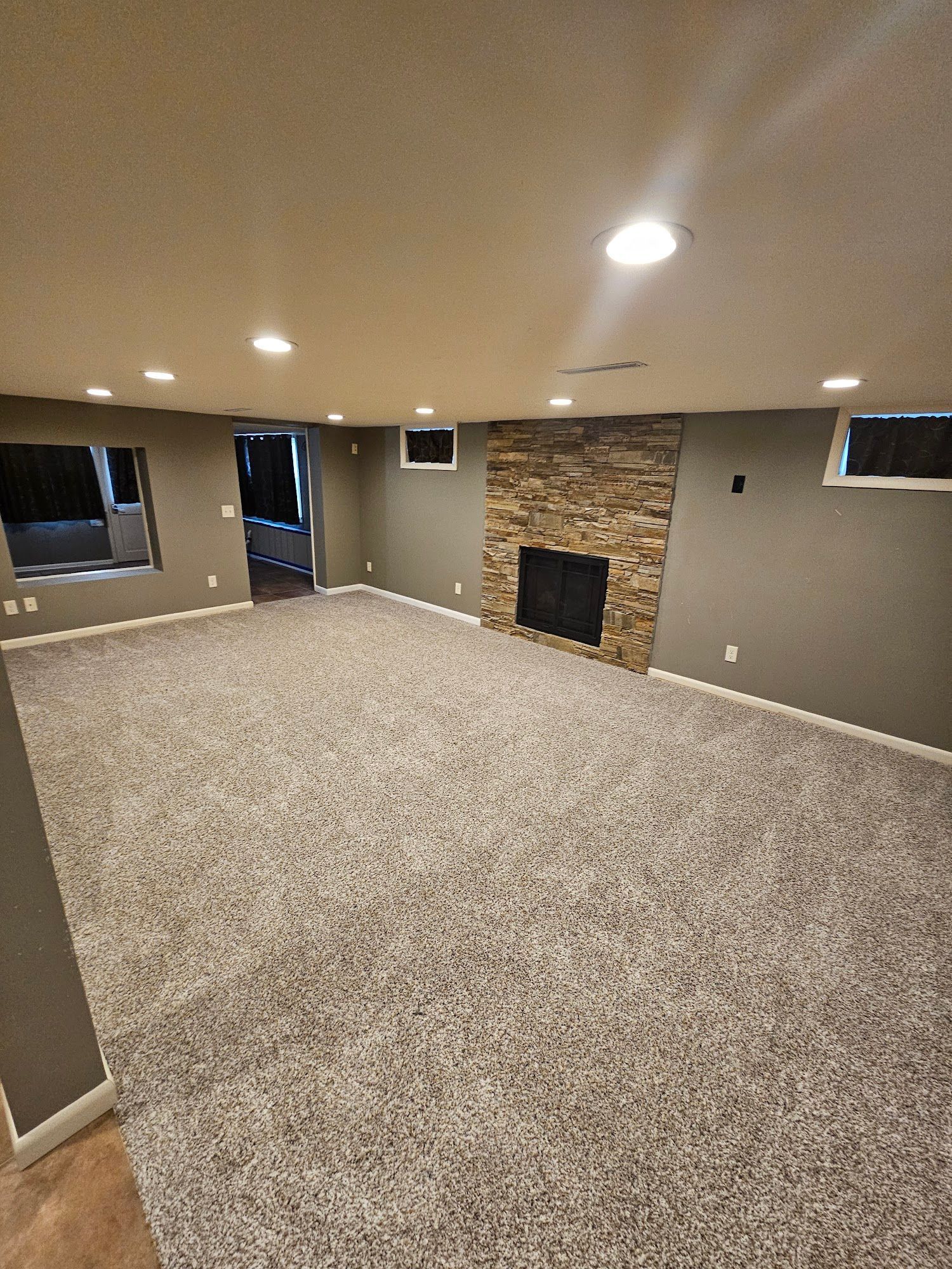 There is a fireplace in the middle of the room.