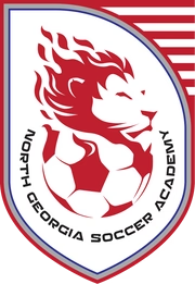Logo for North Georgia Soccer Academy featuring a red, flaming lion head combined with a soccer ball on a white shield.