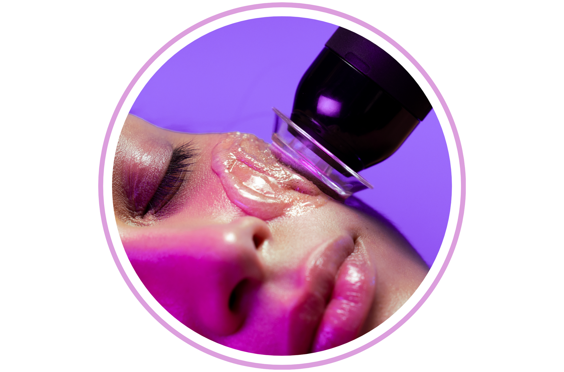 Close-up of a person's face with a device applying gel, lit with purple and pink hues.