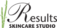 A logo for results skincare studio with bamboo sticks in the background.